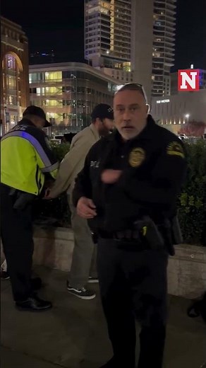 Dallas Police Handcuff Street Preachers Outside Arena