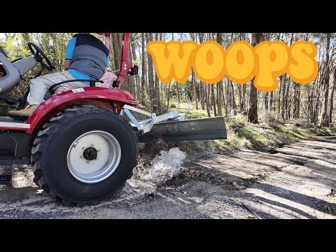 Floating Our Chinese Tractor... first back blade test on the driveway!