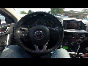 How to reset the onboard computer in the Mazda CX-5?