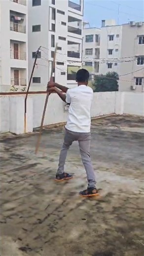 "Centre Stick Spin Mastery 🔥#silambam#martial art#stick #performance #rotation