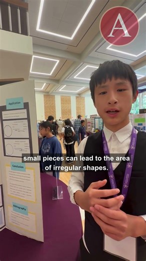 Middle schoolers explain science fair projects at LSU