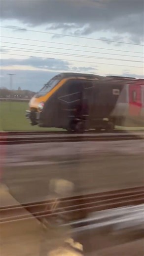 LNER Azuma racing a CrossCountry Voyager on the approach to York