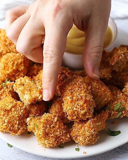 these are truly the BEST CRISPY BAKED CHICKEN NUGGETS ever! they take just 30 minutes to make with super simple ingredients. kid-friendly, adult approved and perfect for game day! RECIPE: https://www.ambitiouskitchen.com/crispy-baked-chicken-nuggets/ | Ambitious Kitchen