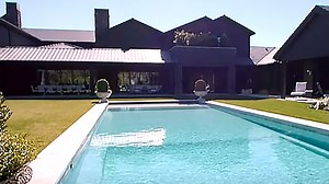 See Kris' stunning pool in her massive backyard at new $20M mansion in new clip