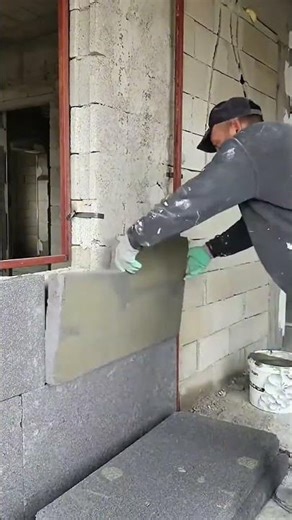 Installing insulation panels for house siding make the house heat and water resistant #construction