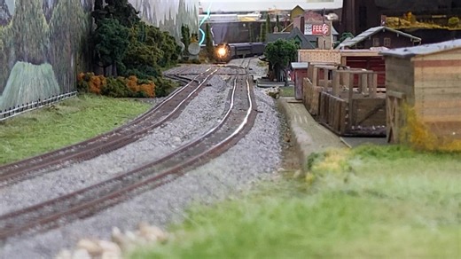 Southern Railway 610 brings an excursion thru the town of Alton. | Suncoast Model Railroad Club