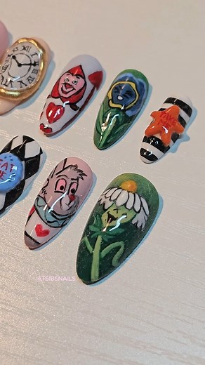 13 comments | alice in wonderland nails ✨️ Did portraits of the Cheshire Cat, White Rabbit, 2 Flowers & a Card Soldier, some 3D elements of the clock, eat/take me cakes & Alice's bow, & a gold chrome rose, which is your fave? ib: @pimppmynailz (flowers) & @allycoolcattt (clock) ♡ Using @gelcare.official @sweetienailsupply @jinb_korea ---- #aliceinwonderland #3dnails #pressonnailset #pressonnails #alice | TSibsNails | Facebook