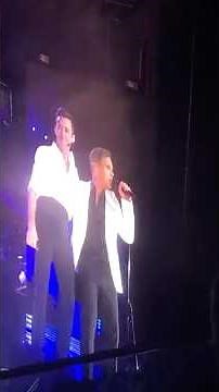 Robbie Williams and Hugh Jackman performing Angels at The O2 (June 2019)