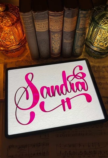 Handlettering the name Sandra in cursive handwriting! 💕✨ If you know someone who shares this name, please tag them in the comments or send them this video! Then tell me what names YOU want to see me write next! Happy Lettering! 🫶🥰#letteringwithamylea🖋️ #handlettering #namewriting #digitalartwork #darkacademiaaesthetic