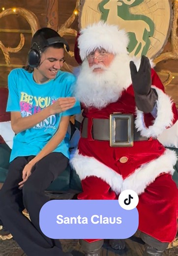 Santa Claus telling Thomas that he will bring him a nice toy #autism #disneyland #disneyparks #santa #santaclaus