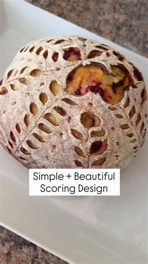 Easy yet beautiful scoring design for this cranberry orange sourdough loaf. Using a toothpick to make dots is easy to do and it adds that extra ✨ Used @amybakesbread cranberry orange recipe but used kamut flour and my easy stand mixer method - I give it 10/10!! 👏🙌 #sourdoughscoring #sourdoughscoringtutorial #sourdoughbreadart #sourdoughart #cranberryorange | Kelly Nordfelt