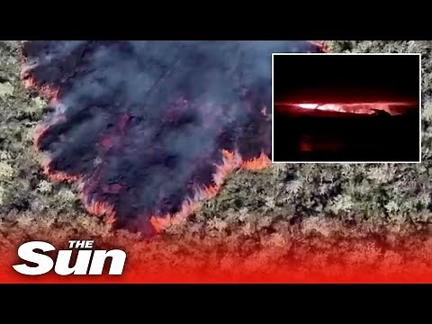 Galapagos Islands volcano erupts spewing lava and clouds of ash