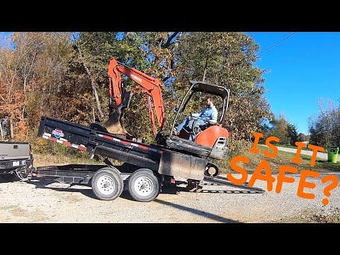 Loading a Mini Excavator in a Dump Trailer