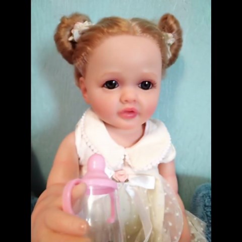 RXDOLL Reborn Baby Dolls Silicone Full Body Girl 22" Toddler Lifelike Dolls Realistic Long Hair Waterproof Toddler Baby Dolls with Green Outfit for Kids Birthday Gifts