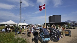 A tiny church in Denmark celebrates community and coziness within 12 walls — one for each apostle