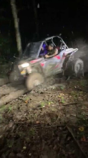 Blake in his rzr playing in the mud