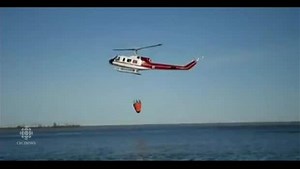 La Ronge resident Kandis Riese captures helicopter preparing to fight fire