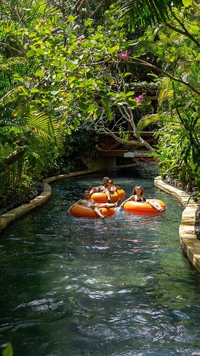 Grab your tube and get ready to join us for an easy Saturday at the Lazy River! Discover our river, where the tropical jungle canopy provides a natural haven. Drift along peacefully, basking in the warm embrace of sunlight filtering through the leaves, with your companions by your side. Pure bliss! 🍃 #lazyriver #balilife #baliadvisor #bestofbali #balitravel #summerchill #summerfun | Waterbom Bali