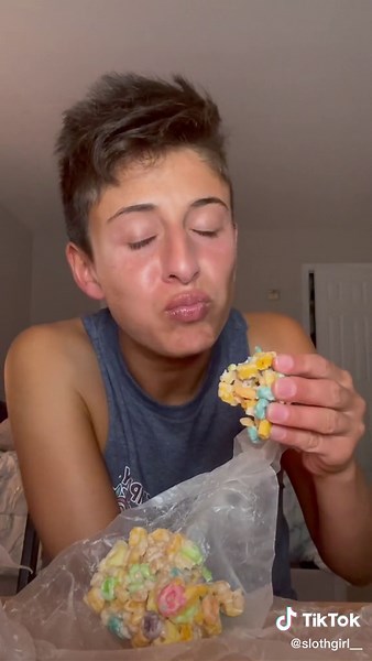 Colorful Cereal Mixing in a Casual Kitchen Setting