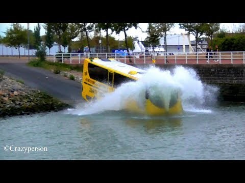 SPLASHTOURS BUS MAKES SPLASH! Amphibus Splashbus in river Rotterdam Netherlands