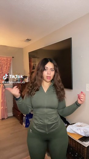 Stylish Olive Green Tracksuit Showcase in Bedroom Setting
