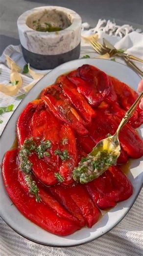 Roasted Red Peppers with Garlic Parsley Dressing- have been loving these peppers ever since I can remember my childhood and for a good reason. I remember summertime my family will fire roast a tons of peppers and freeze them in plastic bags so we have plenty for the winter months- such sweet memories! Ingredients: 7 ling red bell peppers Dill, for garnish Garlic- parsley dressing: 3 garlic cloves 1/4 cup olive oil 2 tbs red wine vinegar 1 1/2 tsp salt 1/4 tsp black pepper 2 tbs parsley, chopped 