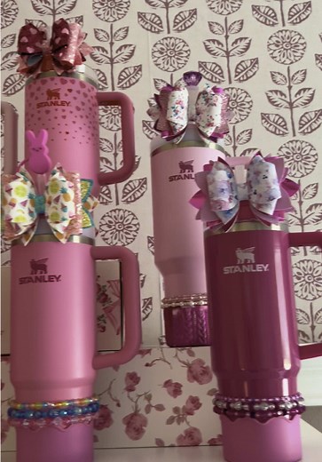 someone told me I play with my stanley cups like they’re barbie dolls… they were right 🎀🩷🌷🍓 #etsy #smallbusiness #stanley #hydrojug #stanleycup #stanleybowtopper #decoratemystanleycup #dressmystanley #fyp #stanleydreamhouse #barbie #barbietiktok #pink
