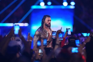 Roman Reigns Reflects on His Father, Family Ties, and WWE Journey With Stephanie McMahon