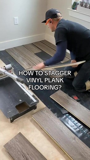 We will show you how to stagger vinyl plank planks for a polished finish. Here are our three tips: \t1.\tMeasure Twice, Cut Once: Always double-check your measurements to avoid mistakes! \t2.\tUse a cutter or a straight edge to cut your planks: A straight edge helps you score clean lines for easy snapping. \t3.\tStagger Strategically: Keep those seams at least a foot apart for a seamless look. Questions? Post them in a comments below. #VinylFlooring #DIYHome #HomeImprovement #FlooringInstallatio