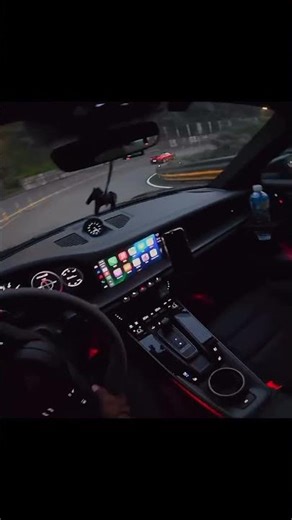 Porche 911 chasing a McLaren 765LT spider