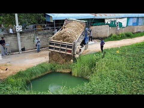 Starting Perfect Project With Bulldozer Covering the Pond Completed