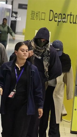Jacob Elordi and Kendall Jenner attempt to go incognito at Brisbane Airport