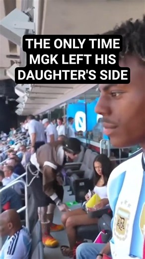 The only time mgk left his daughter's side during the World Cup Final was to💨.That's Paul Wesley btw