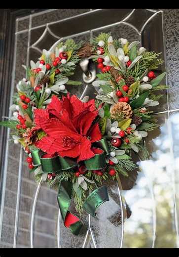 Classic. Cheerful. Christmas-perfect. 🎄❤️ Loved creating this wreath for a client — a blend of timeless greenery, berries, pinecones, and that gorgeous red poinsettia that ties it all together. Little details that make your home feel extra warm and welcoming this season.🎄 #wreathsfordoor #HolidayAesthetic #wreaths #WreathDesign #wreathmaker