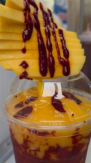 🥭🔥 "Fresh mango, homemade chamoy, and the perfect touch of Tajín. Come get your mangonada
