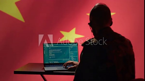China military engineer creating fake accounts on social media to persuade other nations to act in the Chinese government interests. CCP intelligence operator spreading misinformation online, camera A