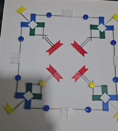 coloured pattern project using flag pins and round pins