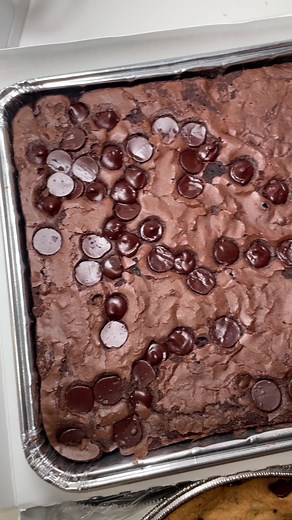 Enjoying a Delicious Pizza Hut Brownie Dipped in Milk