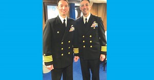 New commander takes helm aboard USS Arlington