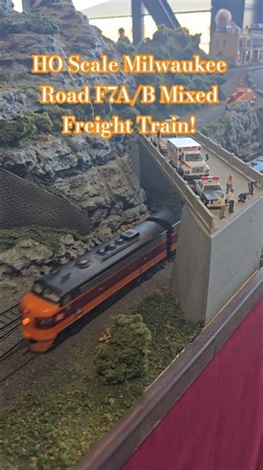 HO Scale Milwaukee Road F7A/B Mixed Freight Train Crosses Under the Overpass!