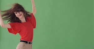 Woman Dancing Backwards Over Green Background Stock Footage Video (100% Royalty-free) 1040913296 | Shutterstock