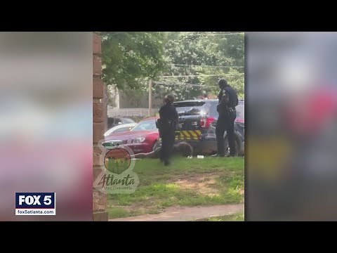 Sergeant, officer 'relieved from duty' after video surfaces showing woman being kicked