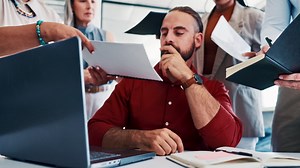 Premium stock video - Business man, multitasking and stress with chaos