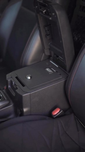 We’ve got boss strong box center console safes, which bolt into the center console so it’s nice and secure! We also have pop and lock bed vaults in stock! | Tacoma Lifestyle