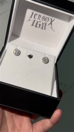 Exquisite Jewelry Box Display with Sparkling Earrings and Ring