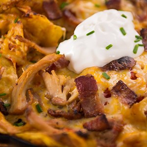 234K views · 2.1K reactions | Smoked & Spicy Chicken Nachos - Recipe: https://betterbegrilled.com/recipes/smoked-spicy-chicken-nachos | Grilled | Facebook