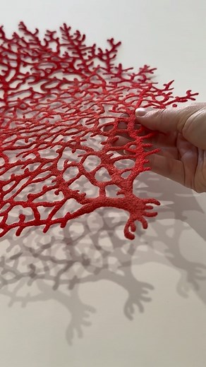 Meredith Dale trading as Meredith Woolnough on Instagram: "The making of my new piece ‘Crimson Coral Branch’ (2024) This piece is created using a freehand machine embroidery technique - which is essentially a way of drawing with your sewing machine. The fabric I stitch onto is water soluble so when the stitching is complete the backing is washed away leaving just my thread drawing behind. I refer to this kind of art as sculptural embroidery and it is a lot of fun. Thanks for all the love on this