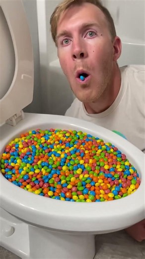 Experiment: Eating Tropical Skittles Candy in the Toilet #shorts