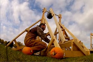 Watch Pumpkins Get Launched By a Massive Slingshot and Trebuchet