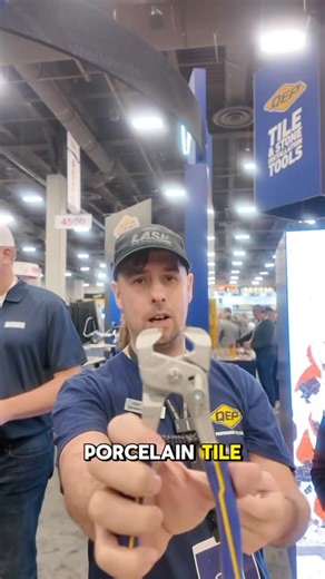 Oscar Barradas | Tile Artist | Shower Building Specialist on Instagram: "David Arnott is on site at Surfaces 2026, Booth #4537, putting the new QEP Artisan Power Nippers to work as he continues building his Las Vegas sign mosaic. #tile #austintx #tiledesign #tileinspiration tileinstallation"